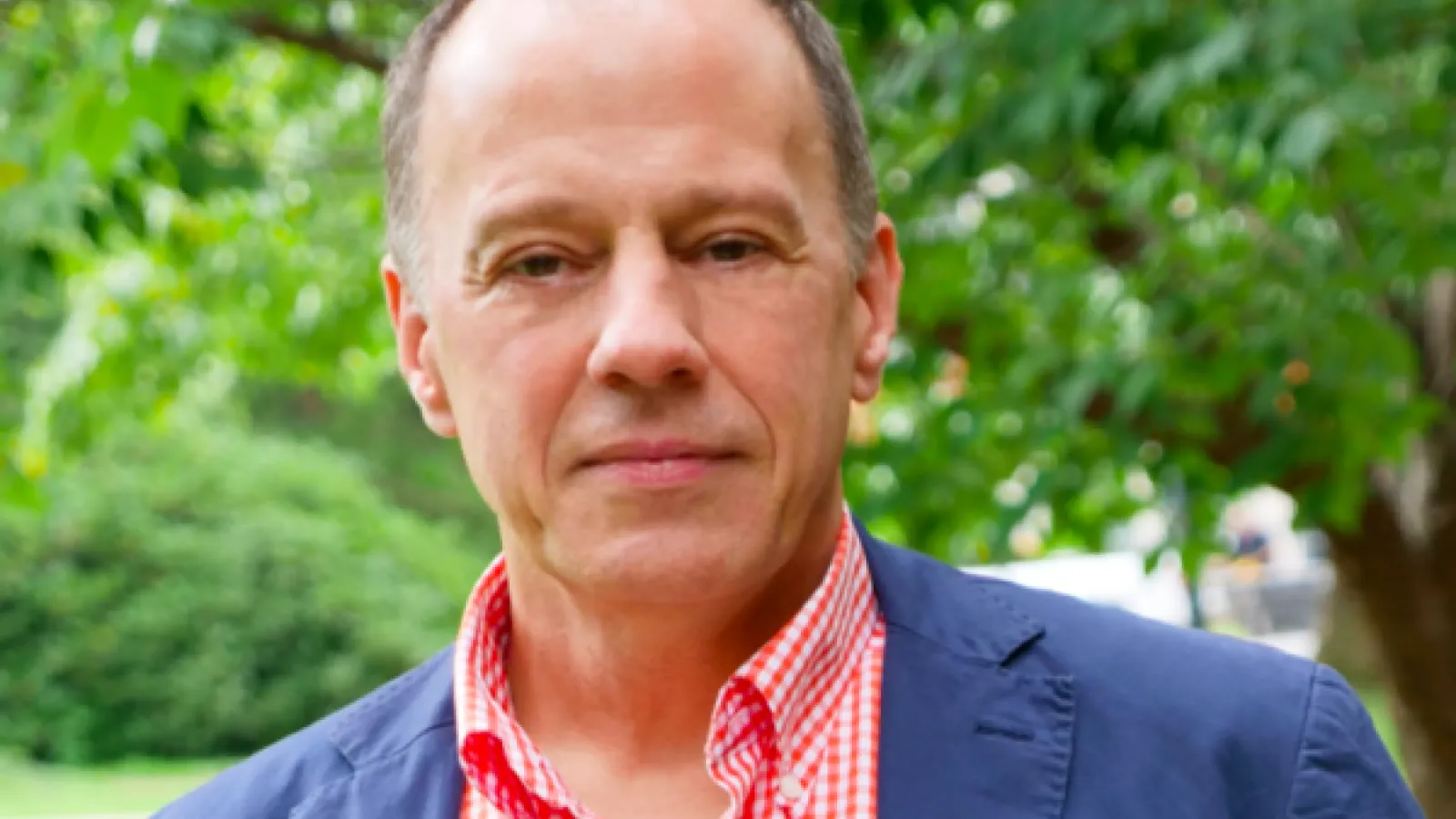 Headshot of Dr. James Raymo